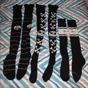 Three pairs of Jack Skellington Socks.